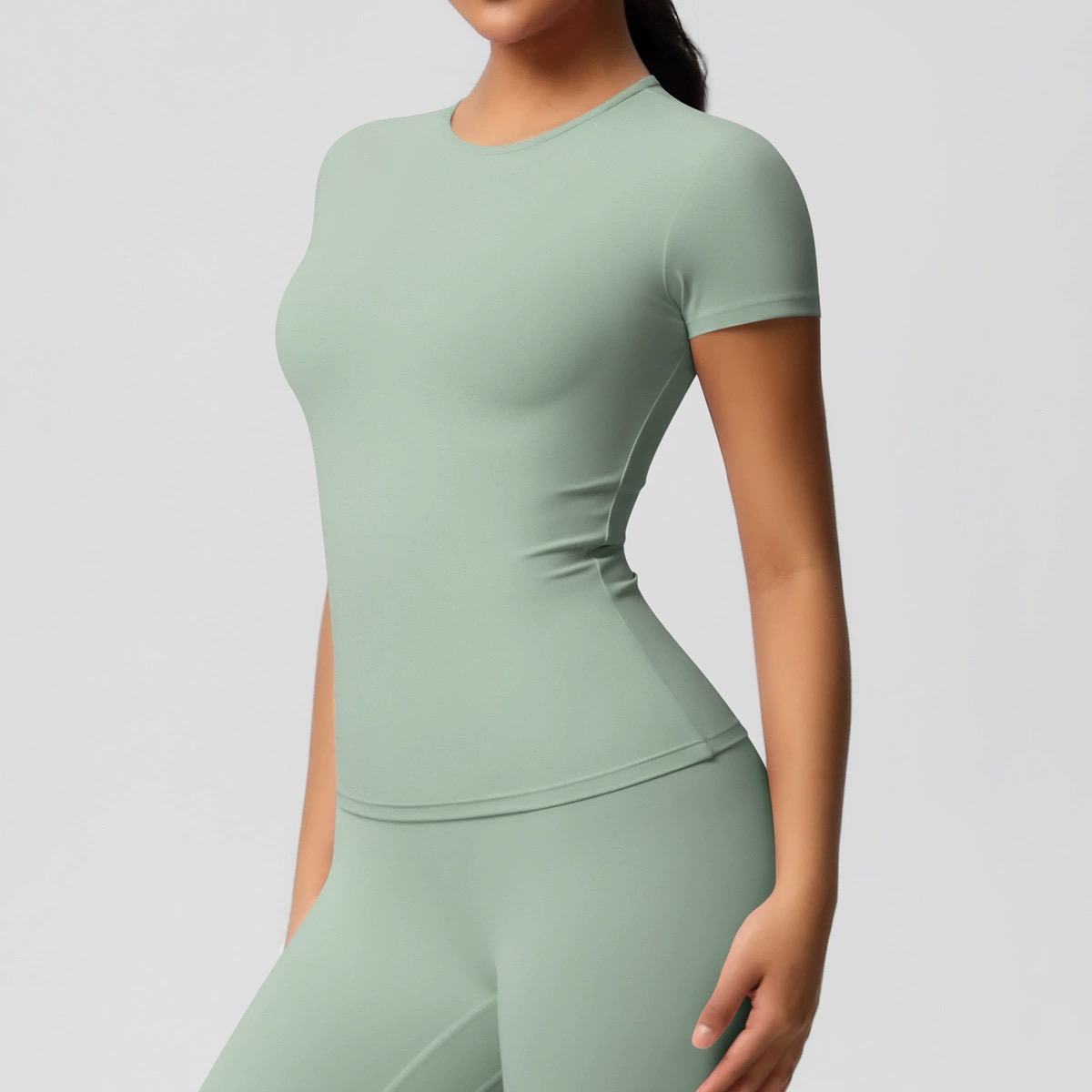 CZ8822-7103 basil green full-length short-sleeve training top