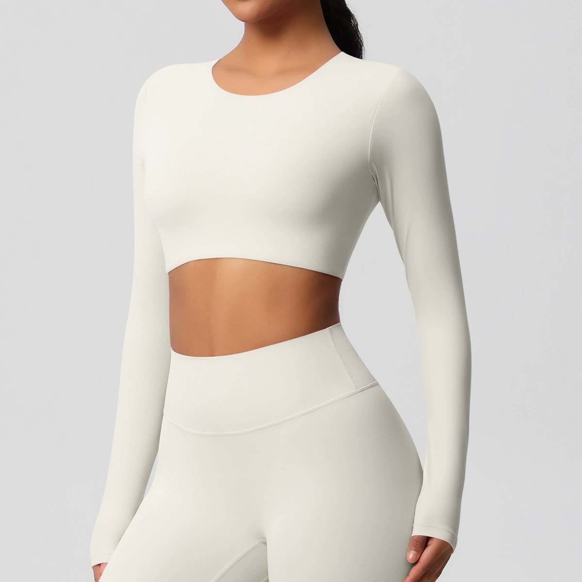 CZ8822-7104 light ivory cropped long-sleeve training top